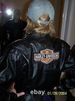 2 Harley bar and shield patches on woman's size Medium black biker jacket