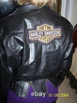 2 Harley bar and shield patches on woman's size Medium black biker jacket