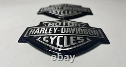 Harley Davidson OEM 62445-10 62446-10 Bar & Shield emblem set Softail dyna metal