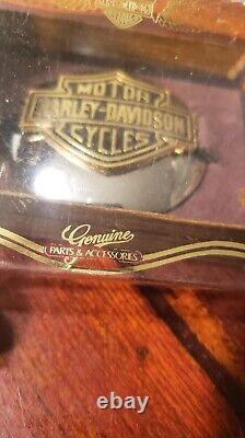 Vintage 1980's NOS Harley-Davidson Bar and Shield medallion gas cap cover. With