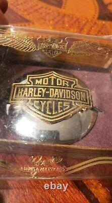 Vintage 1980's NOS Harley-Davidson Bar and Shield medallion gas cap cover. With