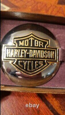 Vintage 1980's NOS Harley-Davidson Bar and Shield medallion gas cap cover. With