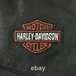 Chaps de moto Harley Davidson pour femmes XS en cuir noir avec logo Bar Shield en stock pour motards.
