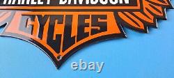 'Vintage 35 Harley Davidson Motorcycle Porcelain Gas Bike Bar & Shield Logo Sign' would be translated to: 'Enseigne vintage en porcelaine pour moto à essence Harley Davidson 35 avec logo Bar & Shield'